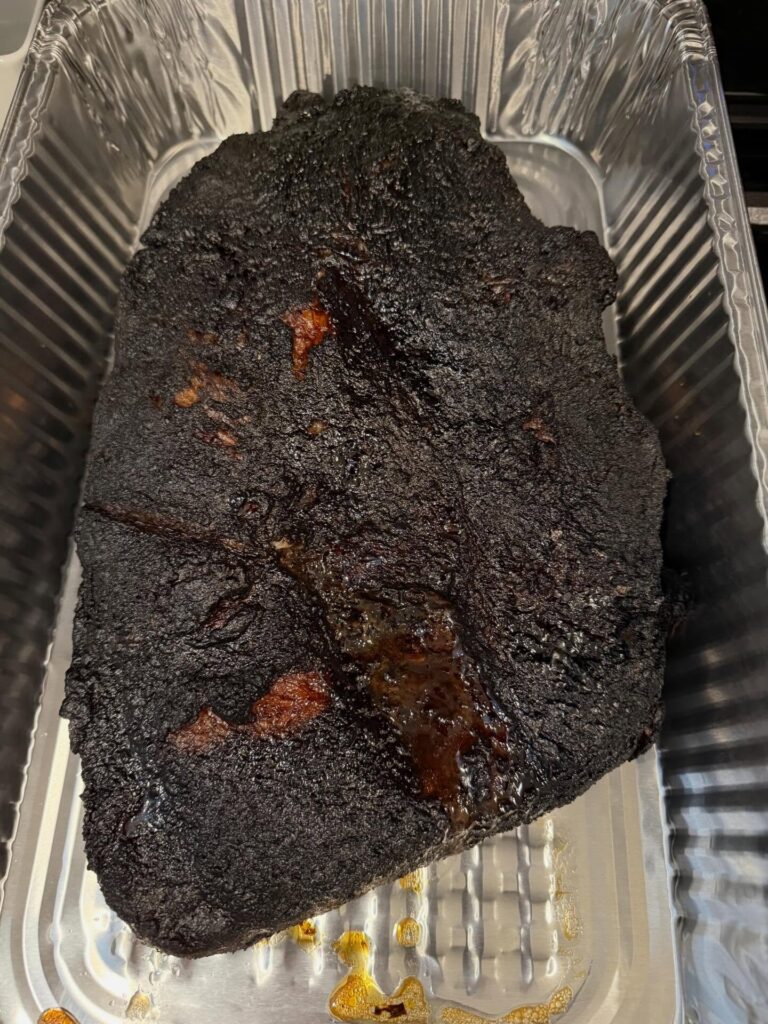 9 pound brisket after smoking on oak (3-5 hours) and low indirect heat 
